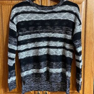Black and White striped sweater.  Attention Size Small
